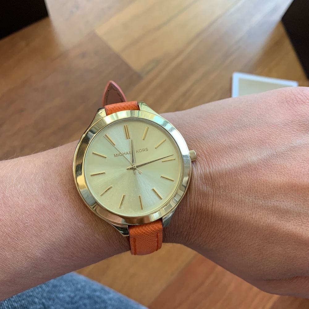 gold stainless steel with leather strap watch